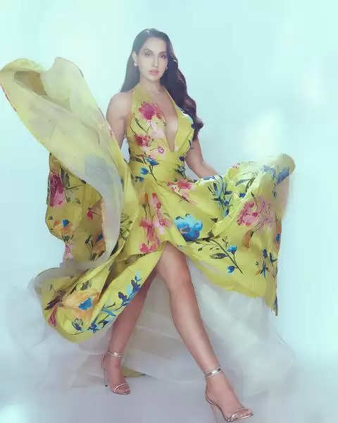 Photos: Nora Fatehi Makes Head Turn In Floral Dress With Thigh-high Slit, Check Pictures